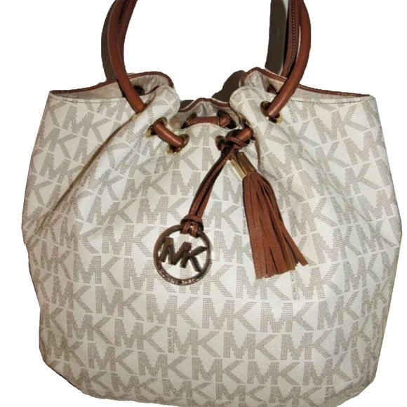 Michael Kors Handbags - NWOT Michael Kors signature leather tassel tan and brown shoulder tote bag